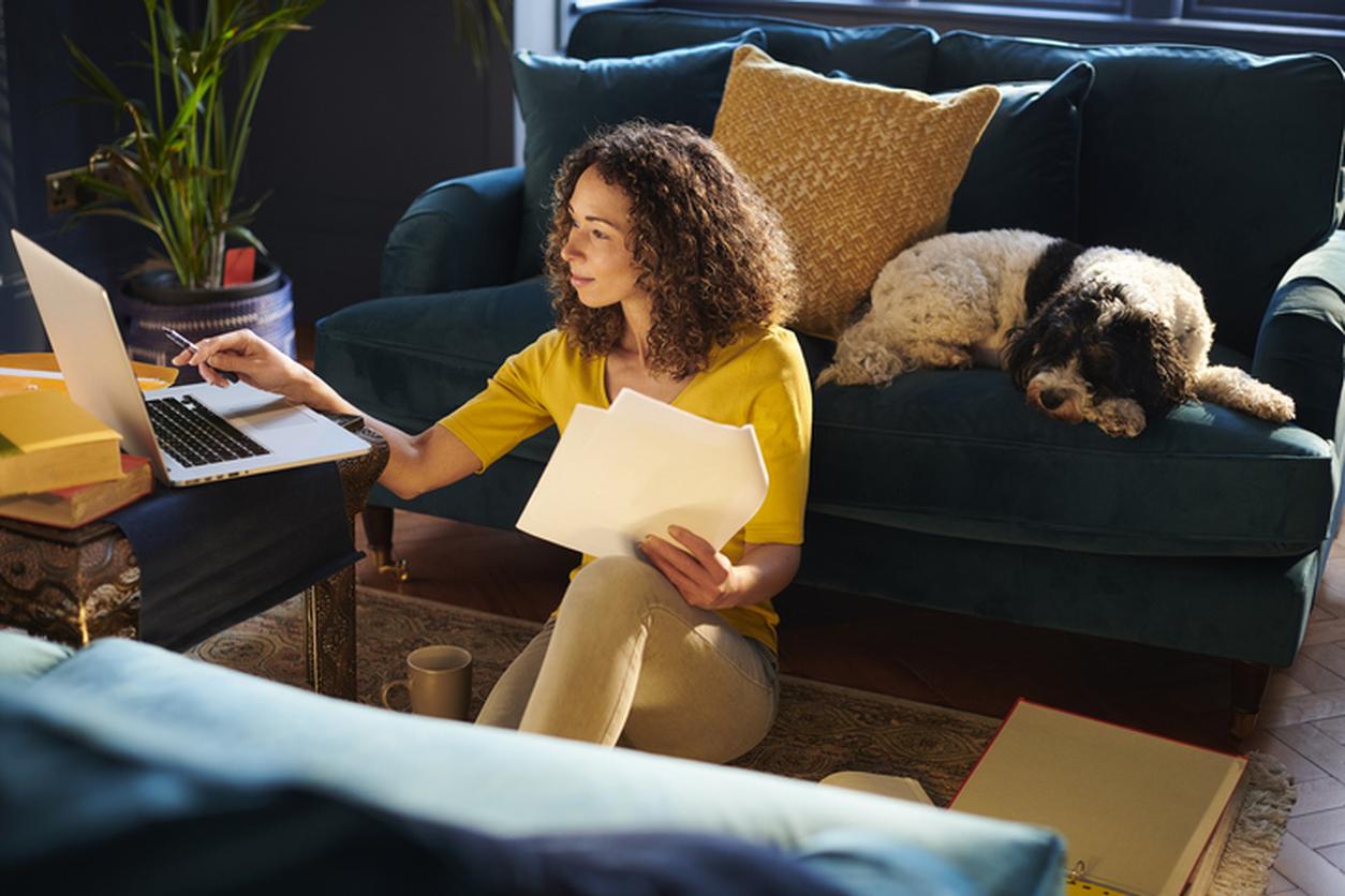 Woman looking at laptop