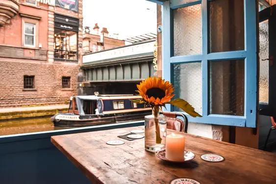 Image from Blend cafe looking out at a river boat