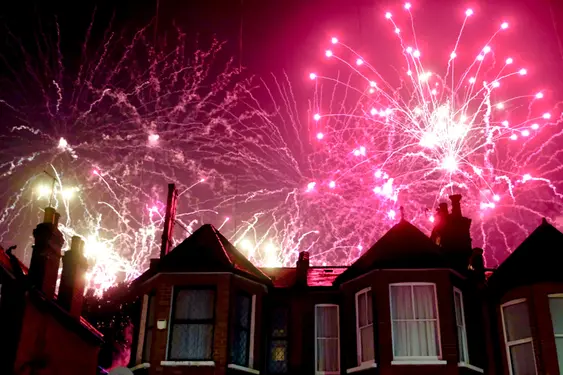 Fireworks over some terraced homes in London