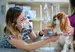 Cavalier King Charles Spaniel being examined by a vet