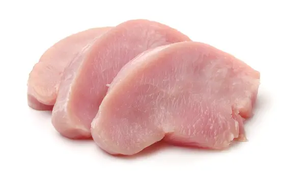 raw turkey on white background