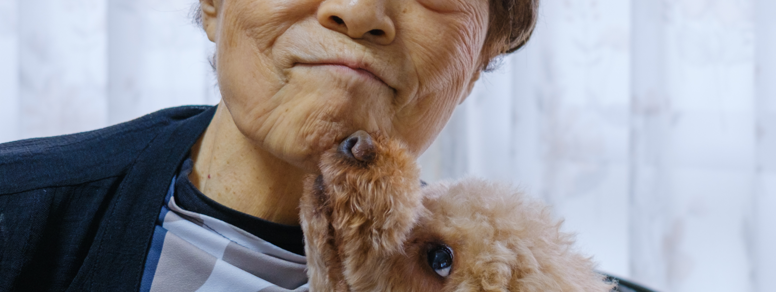 Image of an older woman with a dog