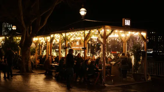 Image of a stall near the river at Southbank Christmas Market
