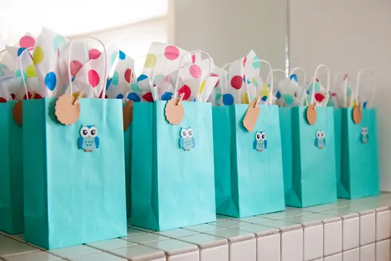 An array of blue party bags