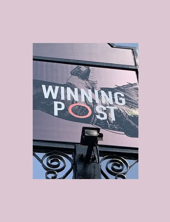 Pub sign that says 'winning post'.