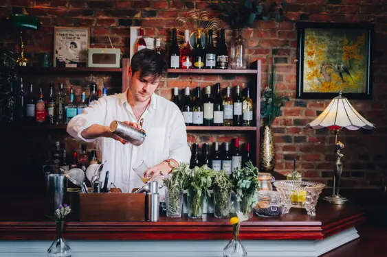 Image of a member of staff making drinks at No. Twelve, Nottingham, a plant-based eatery in Nottingham